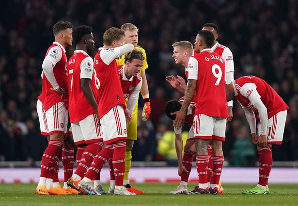 Oleksandr Zinchenko (centre right) tries to rally his team-mates