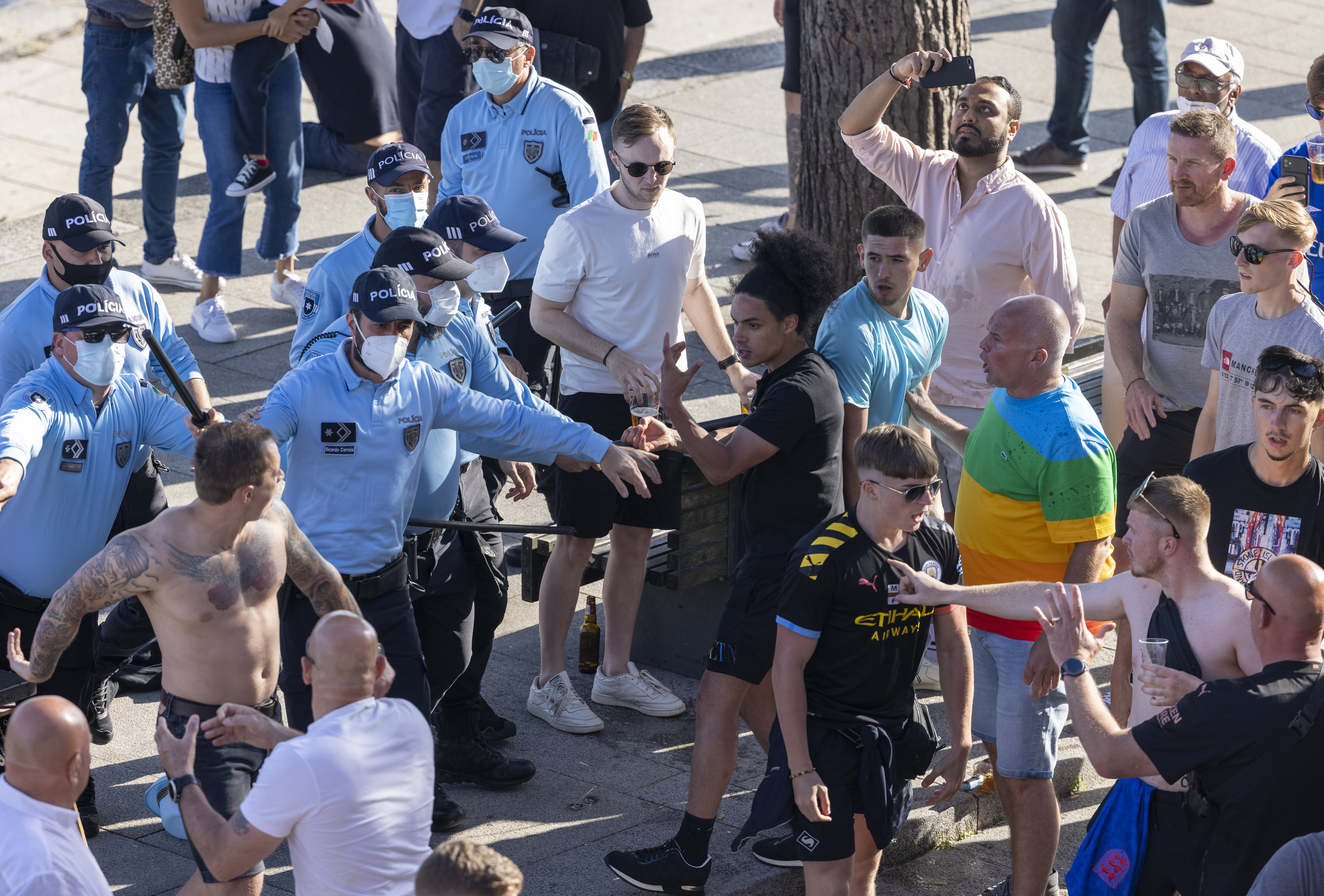 Tempers flared in Porto today between Chelsea and City fans