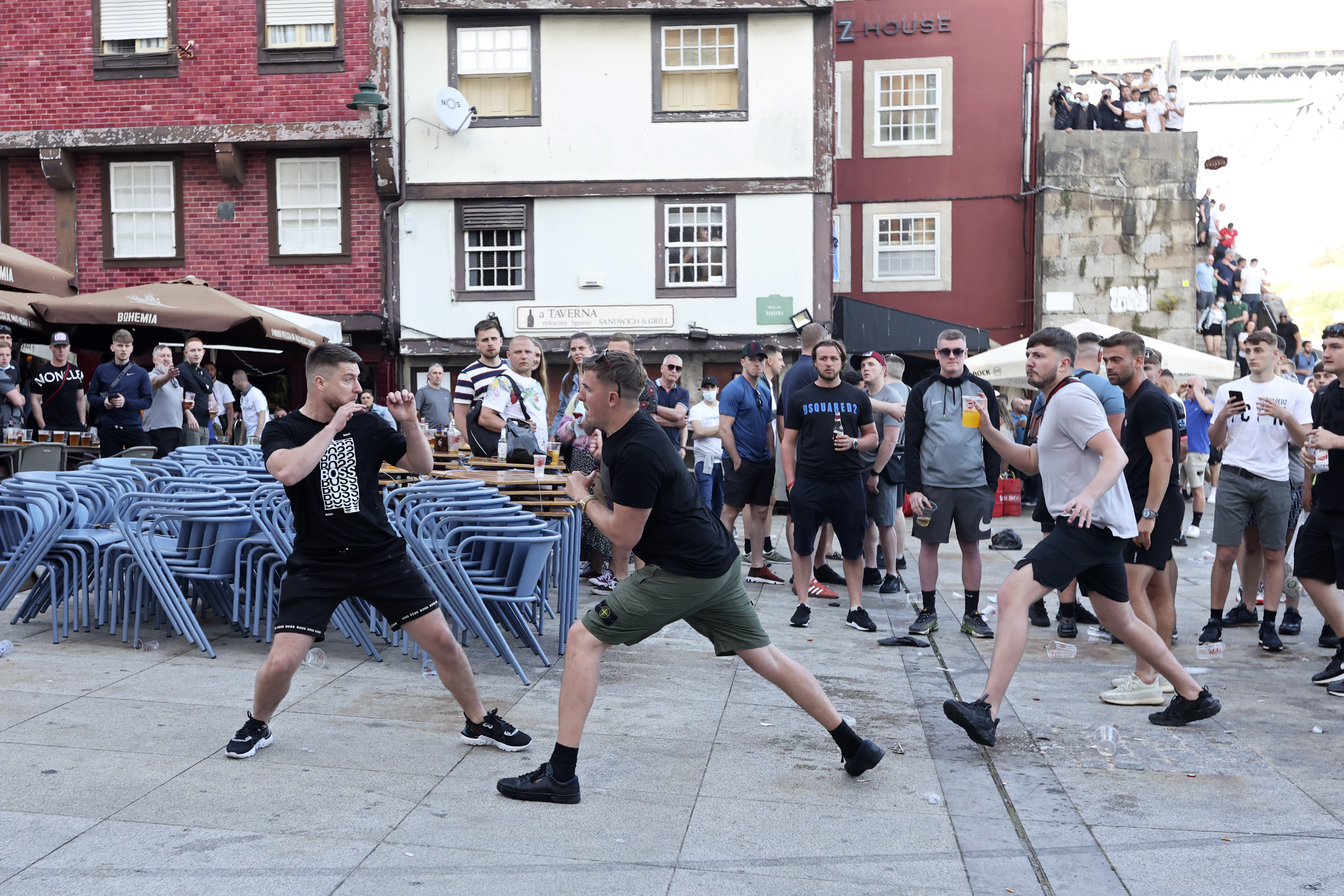 Young lads scrap outside bars in the Portuguese city