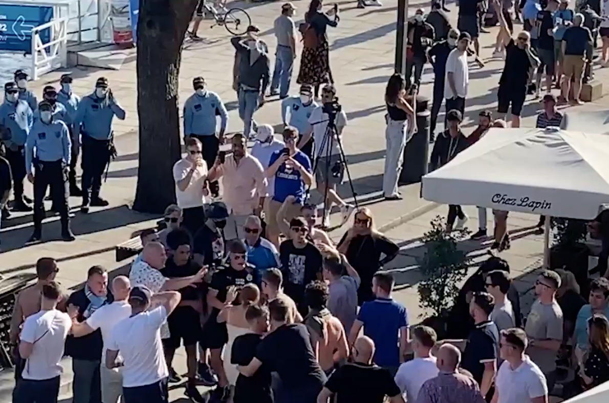Two groups of fans scuffle outside a boozer on Friday
